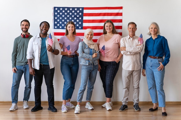 A diverse group of people standing in line to vote at a polling place, representing the broad spectrum of American voters.